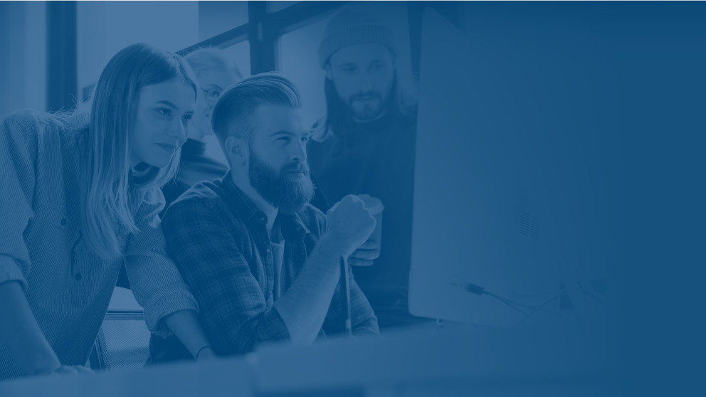 Small business employees working with technology