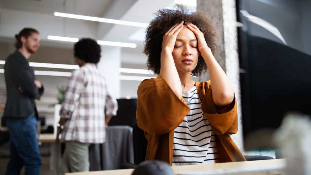 Frustrated woman using a computer